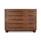 Modern American 10-Drawer Dresser by Vermont Furniture Designs featuring a natural finish, sleek metal handles, and short modern legs.