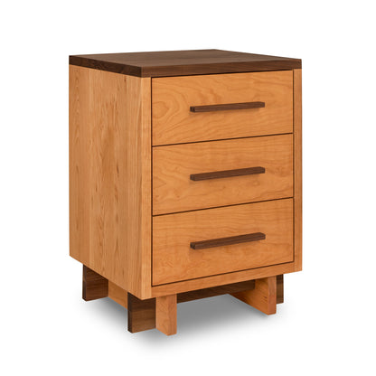 Vermont Furniture Designs Modern American 3-Drawer Nightstand crafted from eco-friendly hardwoods with dark accents.