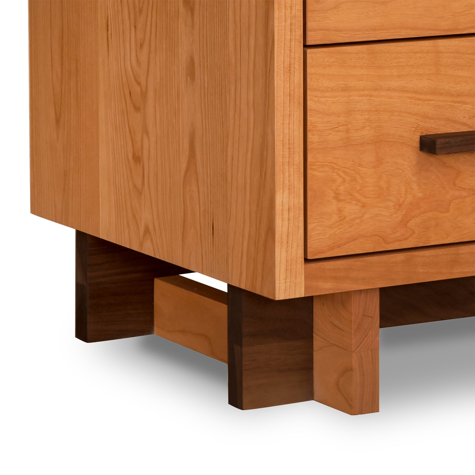A Vermont Furniture Designs Modern American 3-Drawer Nightstand, perfect for a luxury bedroom.