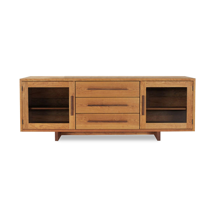 A Vermont Furniture Designs Modern American Buffet with glass doors and drawers.