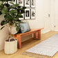 Modern American Bench by Vermont Furniture Designs with pillows, highlighting its sleek design and craftsmanship.