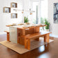 Modern American Bench by Vermont Furniture Designs with wooden dining table and white dishes.