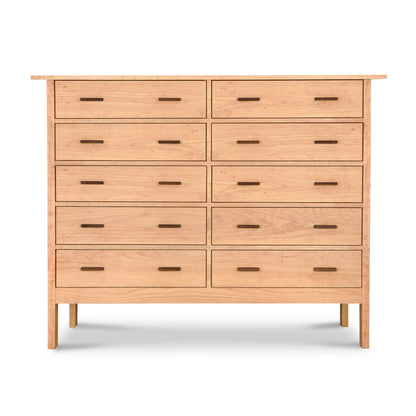 This Modern Craftsman 10-Drawer Dresser by Vermont Furniture Designs features a light natural finish with ten drawers arranged in two rows of five. Each drawer is equipped with simple, rectangular handles, and the dresser's overall design is minimalist, showcasing straight lines and no additional ornamentation, making it an ideal bedroom storage solution.