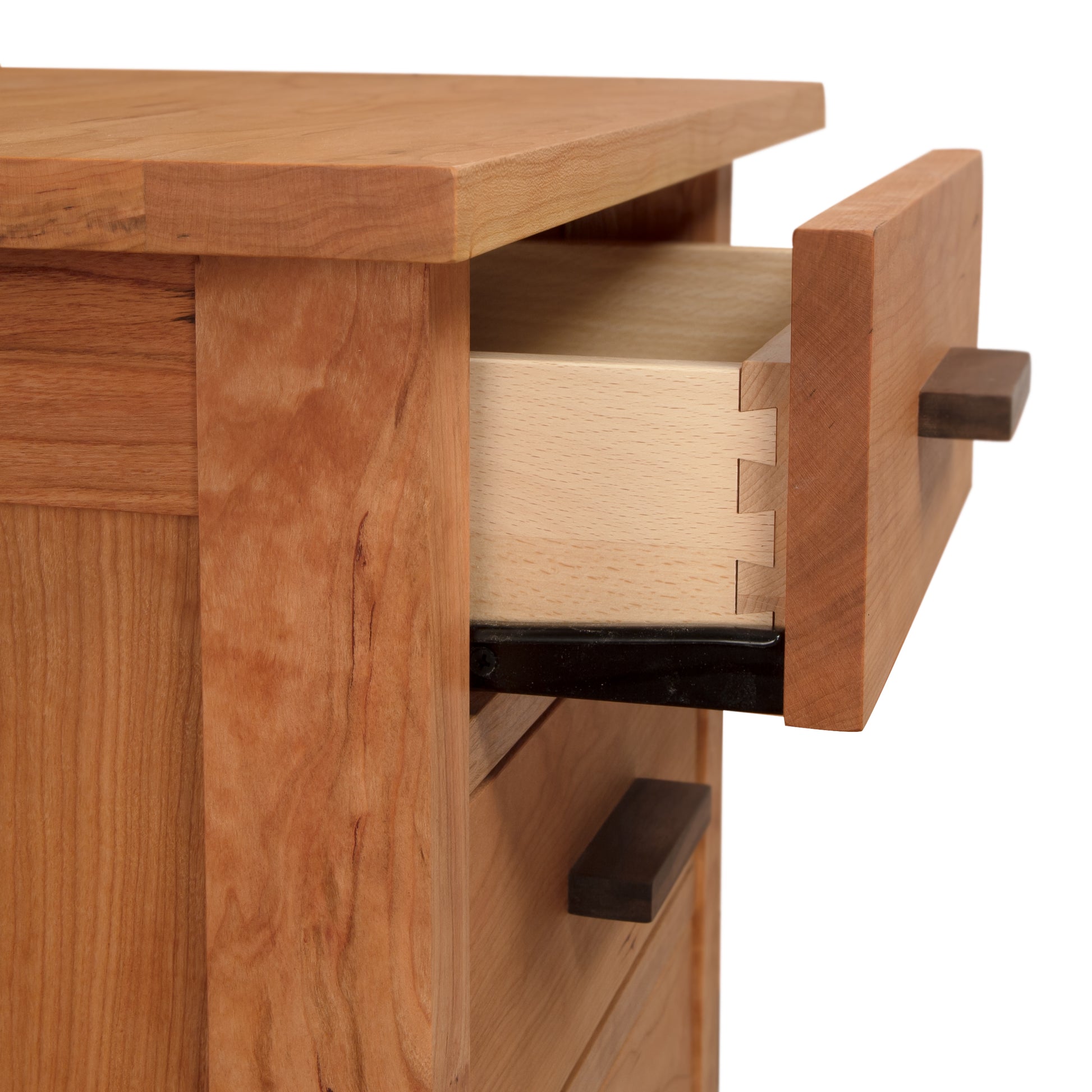 Eco-friendly Modern Craftsman 3-Drawer Nightstand with an open drawer showcasing dovetail joinery by Vermont Furniture Designs.