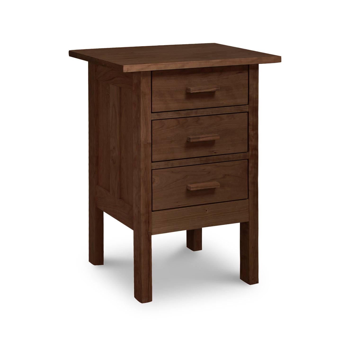 A Modern Craftsman 3-Drawer Nightstand by Vermont Furniture Designs isolated on a white background.