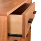 Open wooden drawer demonstrating dovetail joinery on a white background, part of a Vermont Furniture Designs Modern Craftsman 6-Drawer Dresser.