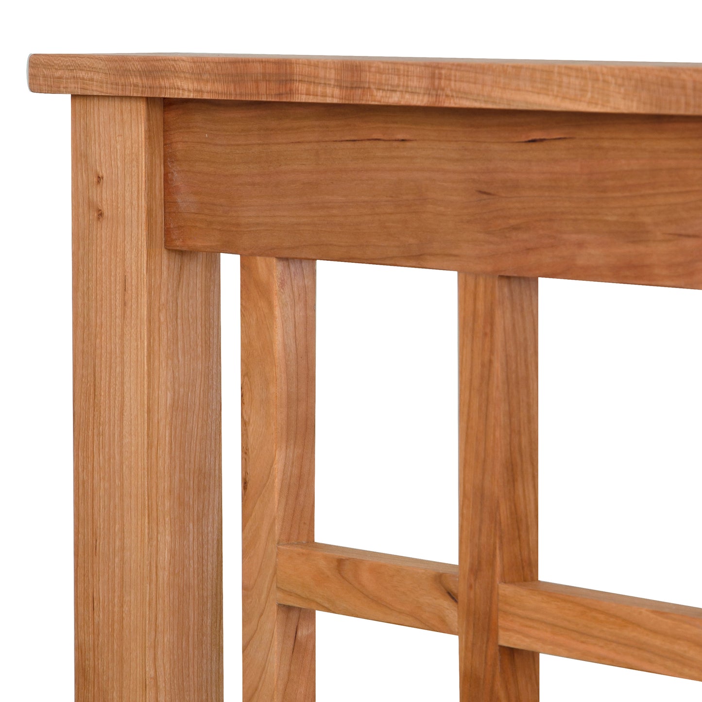 Close-up of a Vermont Furniture Designs Modern Craftsman High Footboard Bed corner showing detail of the wood grain and eco-friendly oil finish.