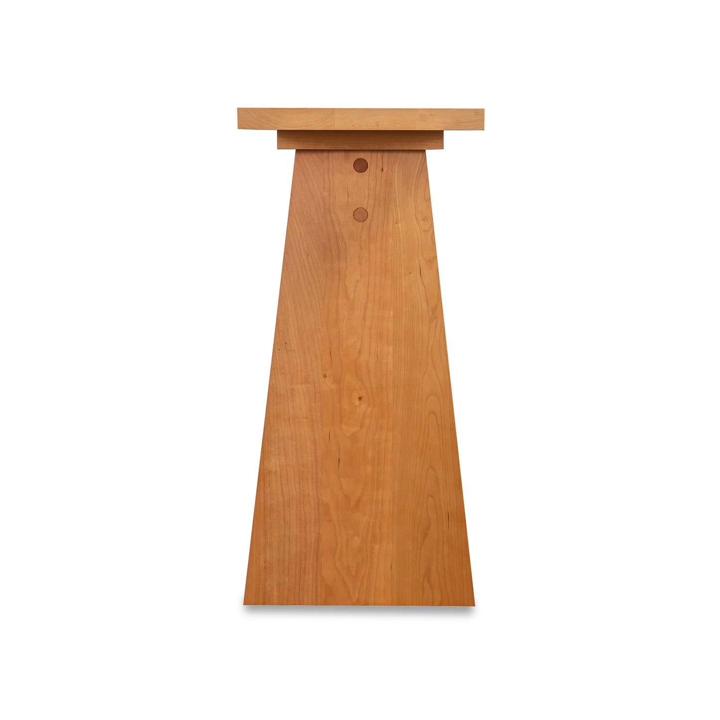 Modern Designer Sofa Table by Lyndon Furniture with a trapezoidal solid wood base and natural grain, highlighted in a front view.