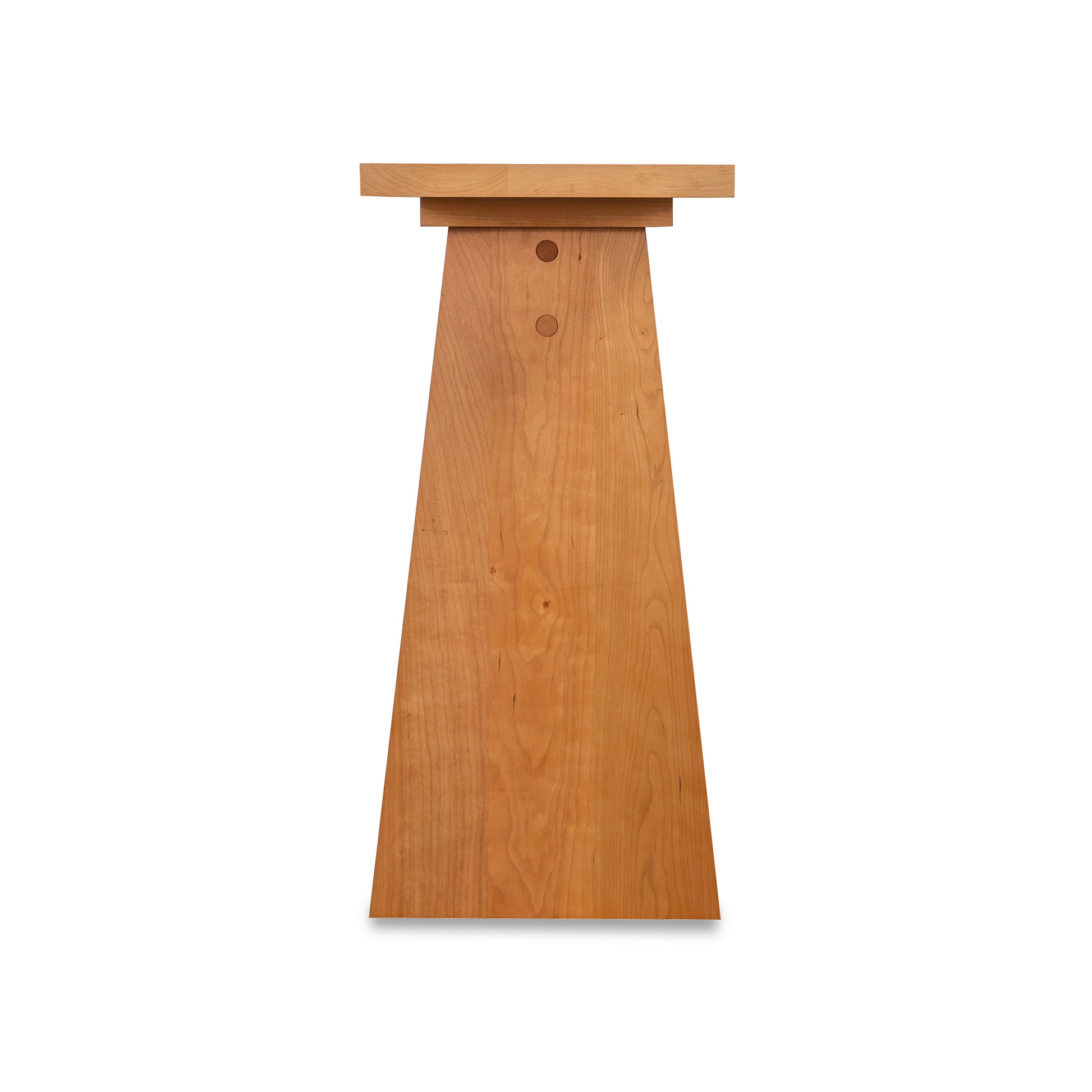 Modern Designer Sofa Table by Lyndon Furniture with a trapezoidal solid wood base and natural grain, highlighted in a front view.