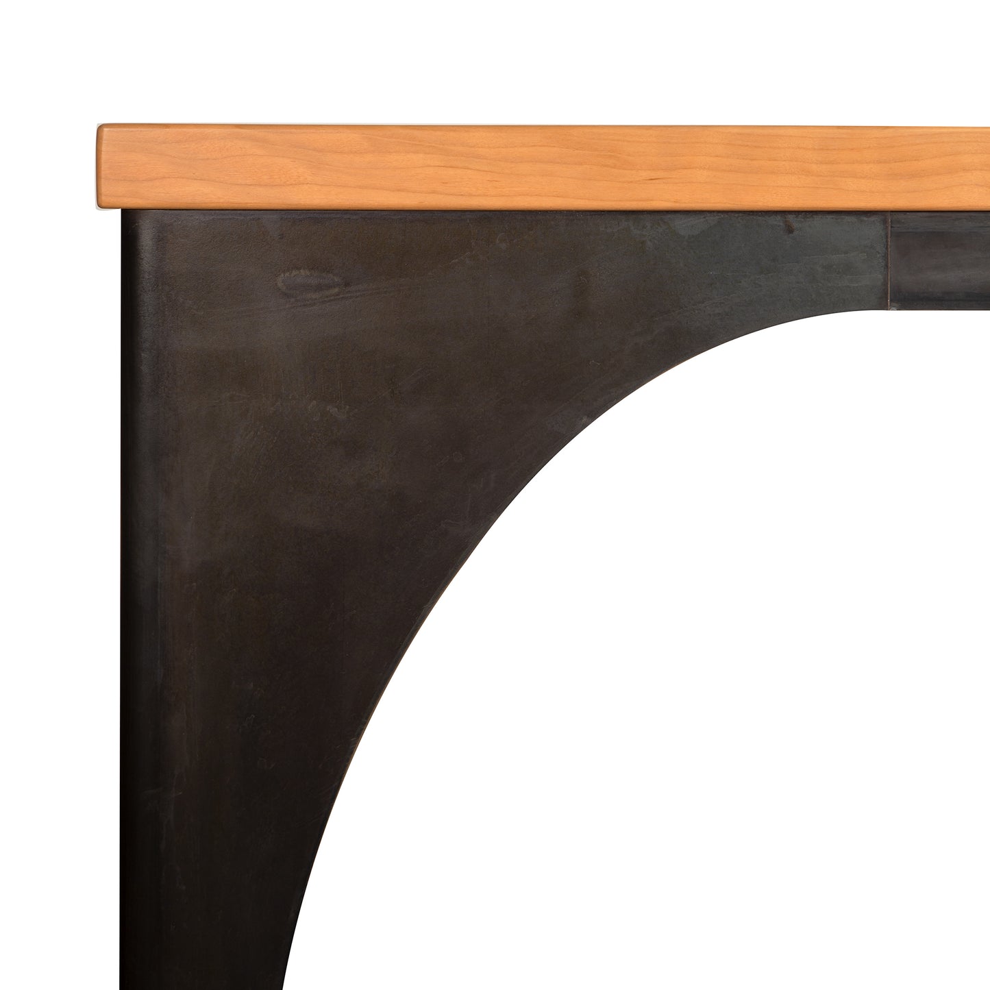 Vermont Woods Studios Modern Industrial Arched Table featuring a light wood top and sleek dark curved metal leg.