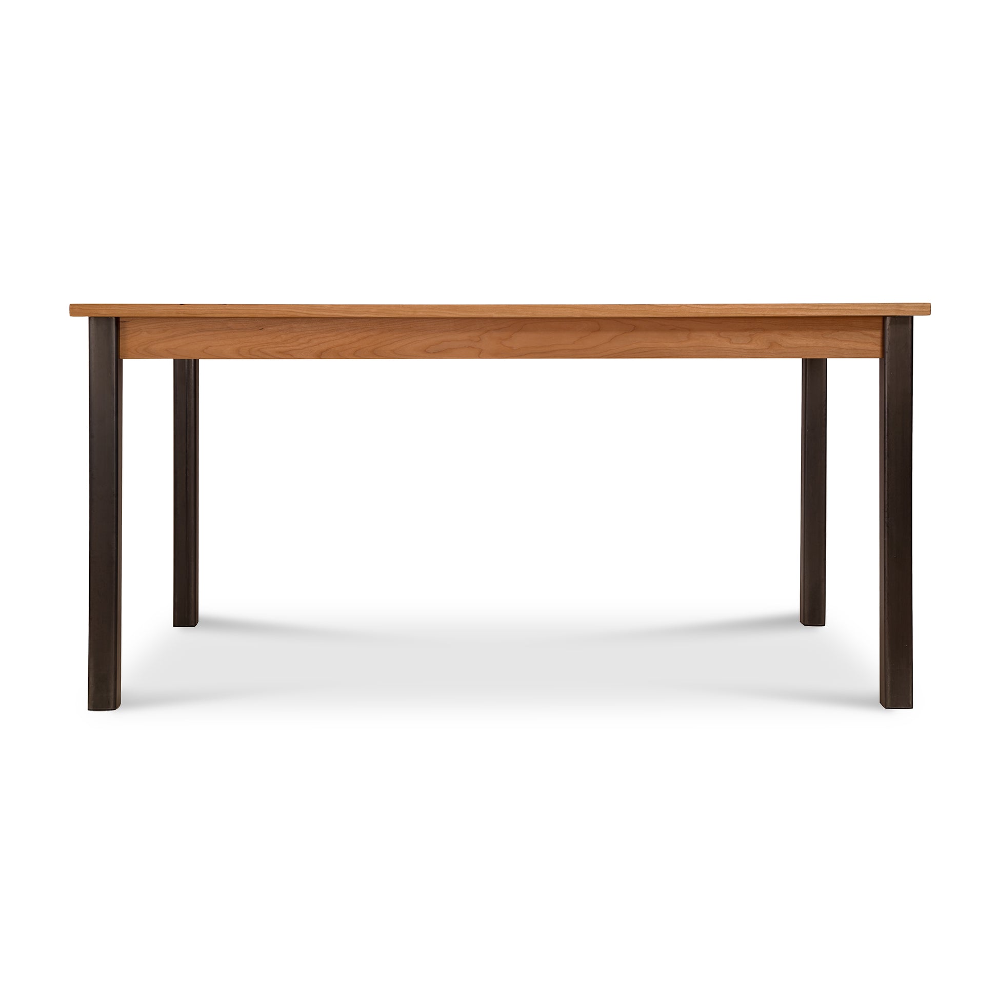 A Vermont Woods Studios Contemporary Farmhouse Table with black legs on a white background.