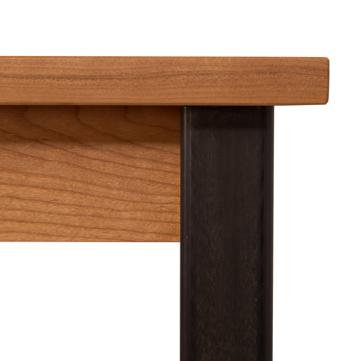 A close up of a Lyndon Furniture Contemporary Farmhouse End Table - Clearance with black legs.