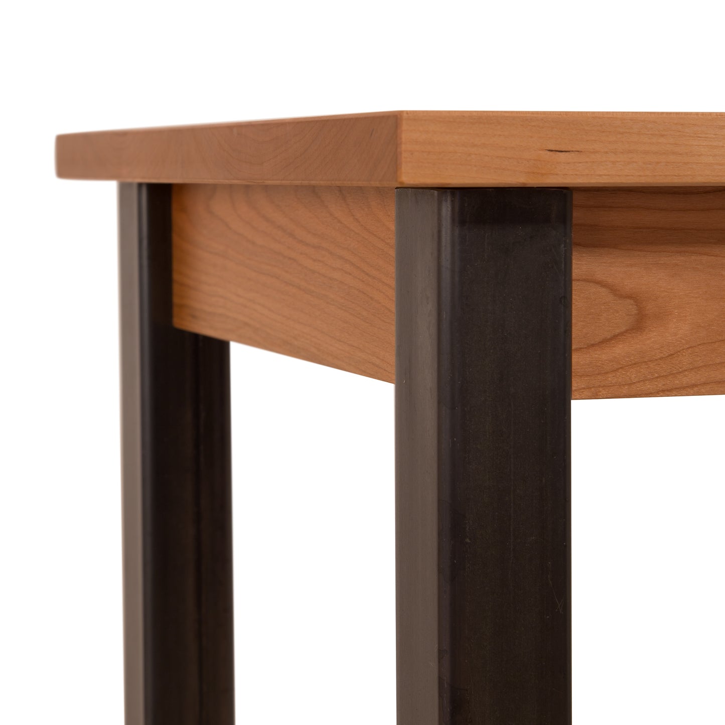 A Lyndon Furniture Contemporary Farmhouse End Table - Clearance with a wooden top and metal legs.