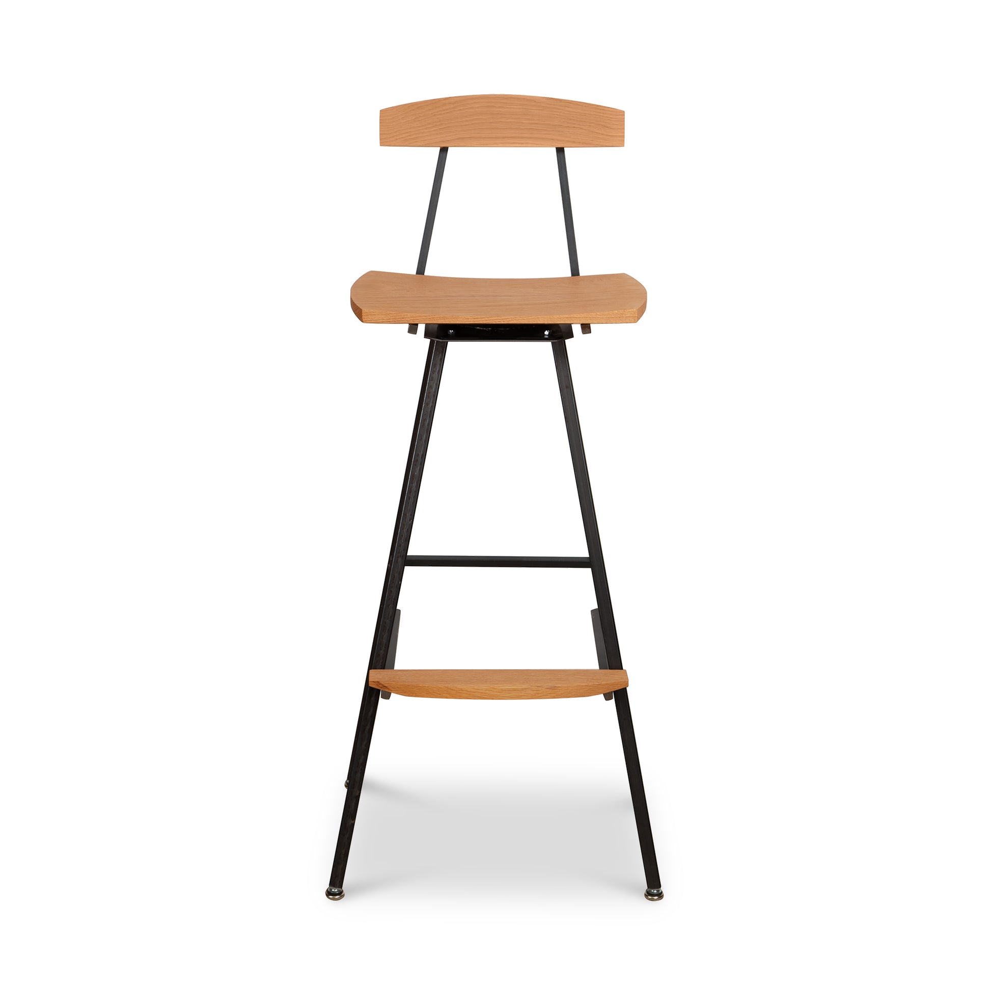 Modern Industrial Stool with Back by Vermont Woods Studios showcasing a curved wood seat and back, supported by a sturdy black metal frame and integrated footrest.