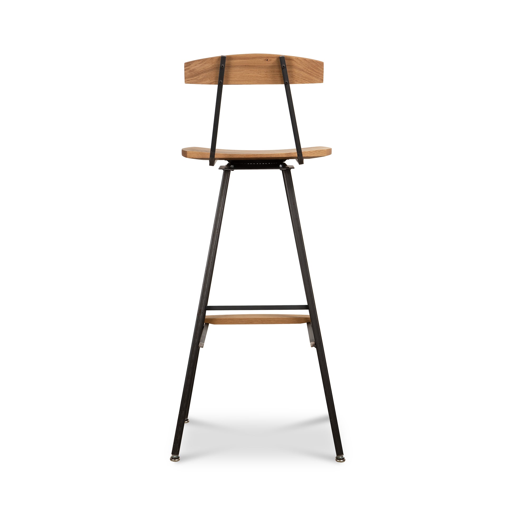 Modern Industrial Stool by Vermont Woods Studios featuring a handcrafted wooden seat and backrest, supported by a sturdy black metal frame with integrated footrest.