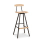 Modern Industrial Stool with Back showcasing a handcrafted wooden seat and sturdy black metal legs in a minimalist industrial style.