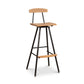 Modern Industrial Stool with wood seat and backrest, black metal legs, and built-in footrest, handcrafted by Vermont Woods Studios.