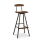 Modern Industrial Stool with Back by Vermont Woods Studios showcasing a tall wooden seat, backrest, footrest, and sturdy black metal legs.