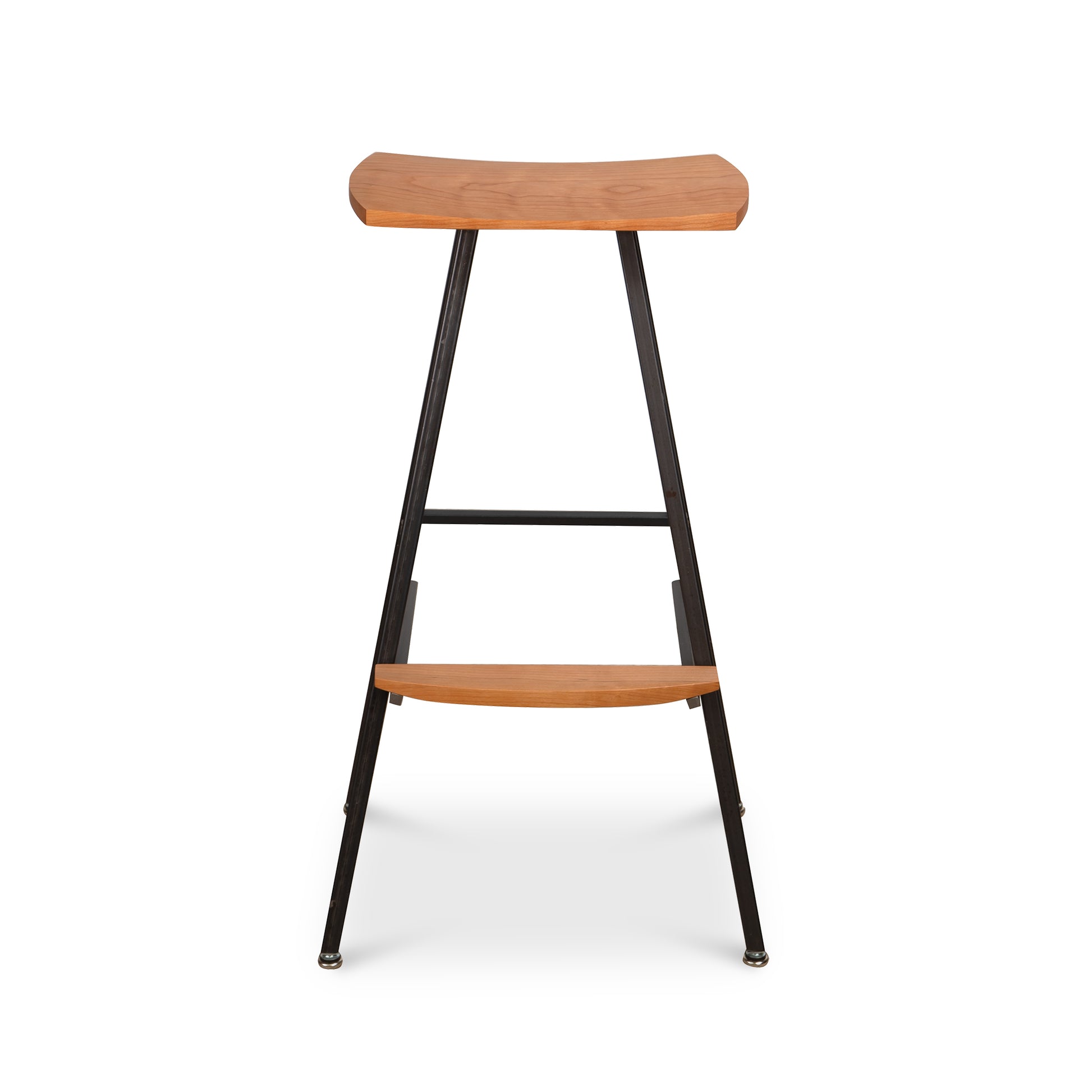 Modern Industrial Stool with a curved wooden seat, black metal legs, and integrated footrest, shown from the front.