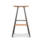 Modern Industrial Stool with a wood seat, integrated footrest, and black metal frame designed by Vermont Woods Studios.