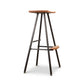 Modern Industrial Stool featuring a handcrafted wood seat and footrest on a sleek black metal frame, highlighting quality American craftsmanship.