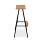 Modern Industrial Stool with square wood seat, metal legs, and wood footrest crafted by Vermont Woods Studios.