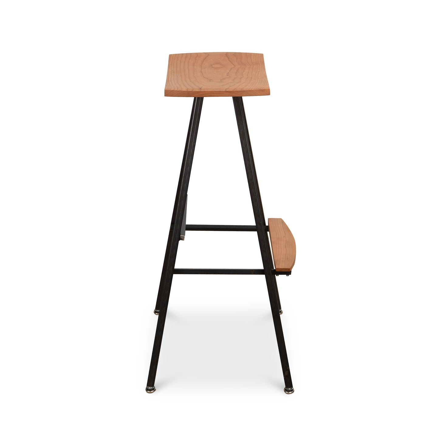 Modern Industrial Stool with square wood seat, metal legs, and wood footrest crafted by Vermont Woods Studios.