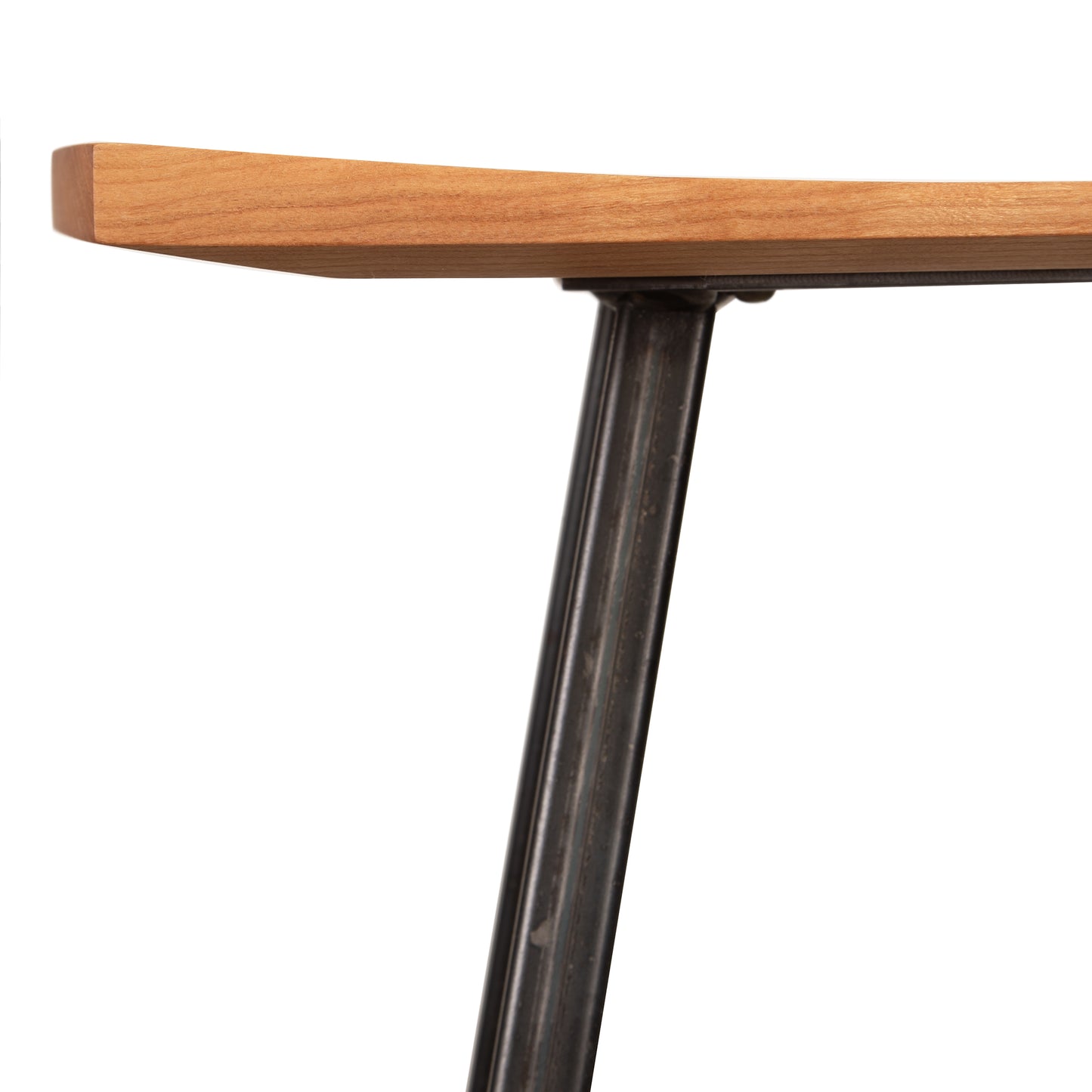 Modern Industrial Stool by Vermont Woods Studios featuring a smooth wooden seat and sturdy black metal leg in a modern industrial design.