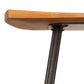 Modern Industrial Stool by Vermont Woods Studios featuring a smooth wooden seat with a sturdy black metal frame, highlighting its unique industrial design.