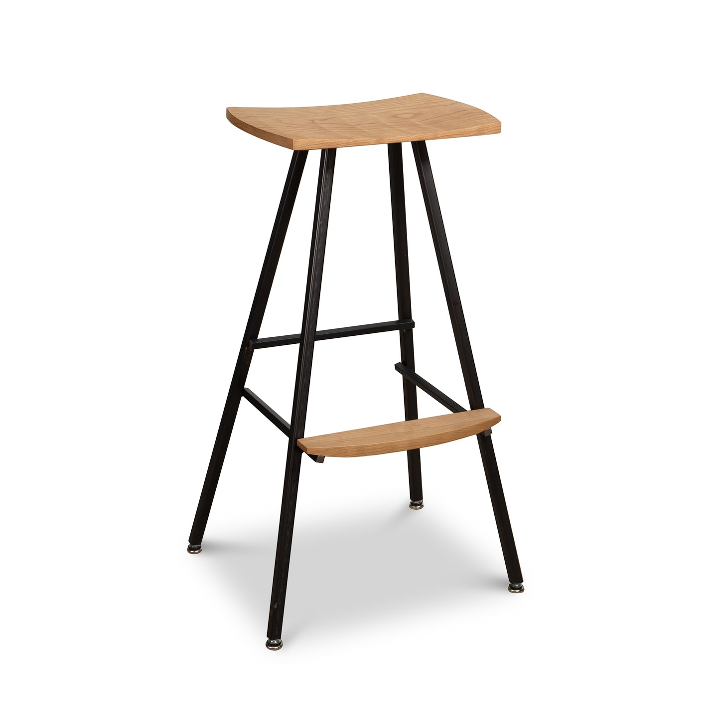 Modern Industrial Stool with a curved wood seat, sturdy black metal legs, footrest, and round feet, handcrafted by Vermont Woods Studios.
