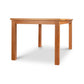 A Lyndon Furniture Modern Mission Parsons Extension Table - Floor Model with eco-friendly legs.