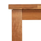 A close up of the Lyndon Furniture Modern Mission Parsons Solid Top Table, an eco-friendly wooden dining table made from sustainable harvested woods.