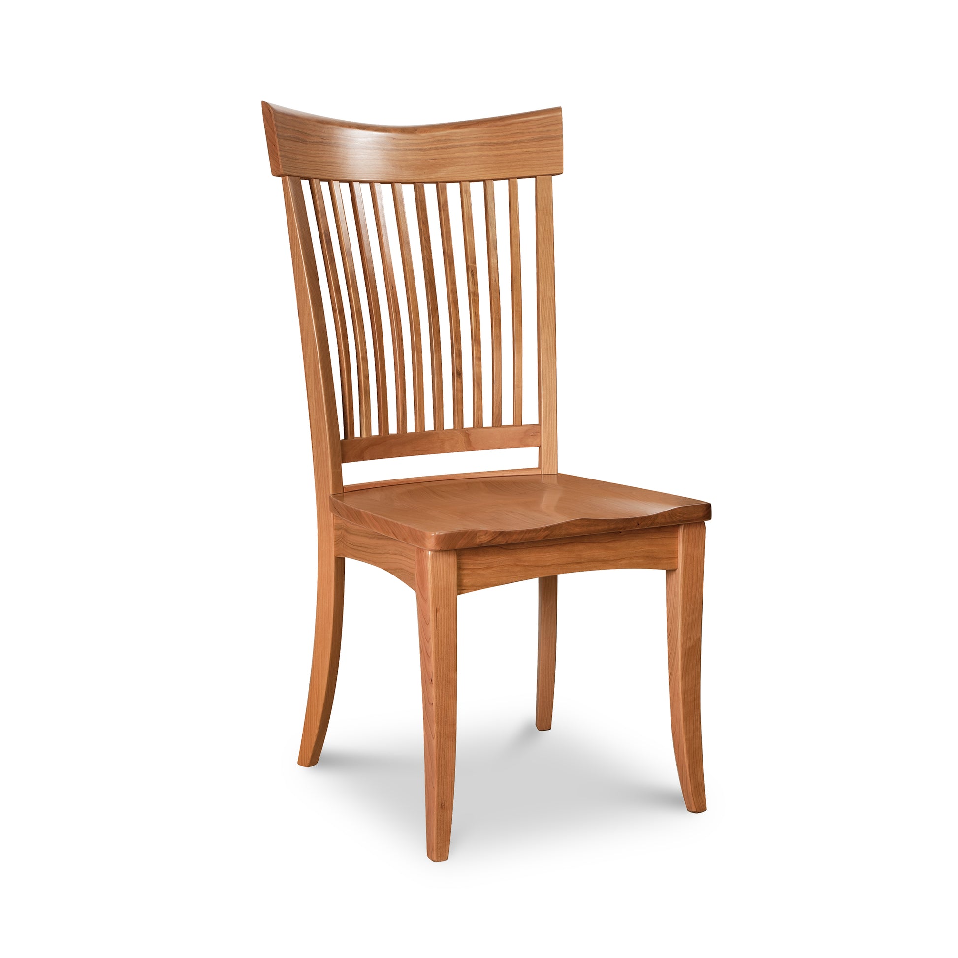 A wooden dining chair with a slatted back.