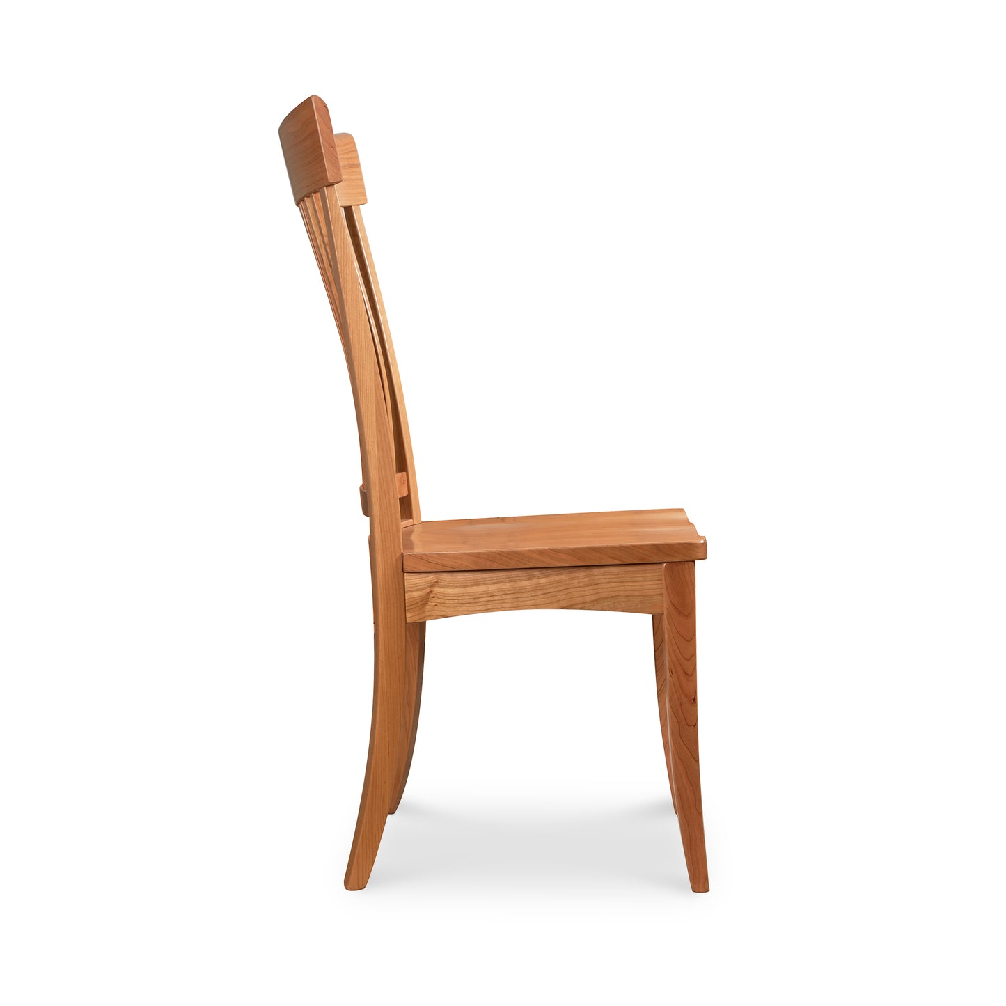 A wooden dining chair on a white background.