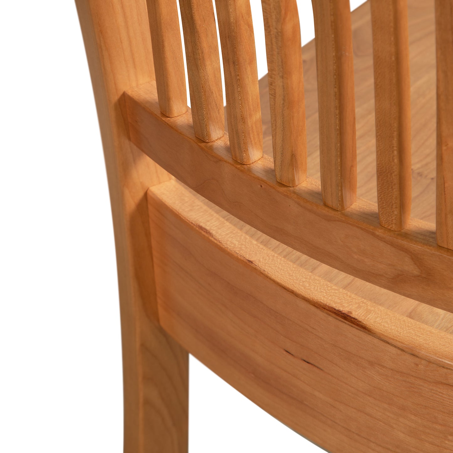 A close up view of a wooden chair.