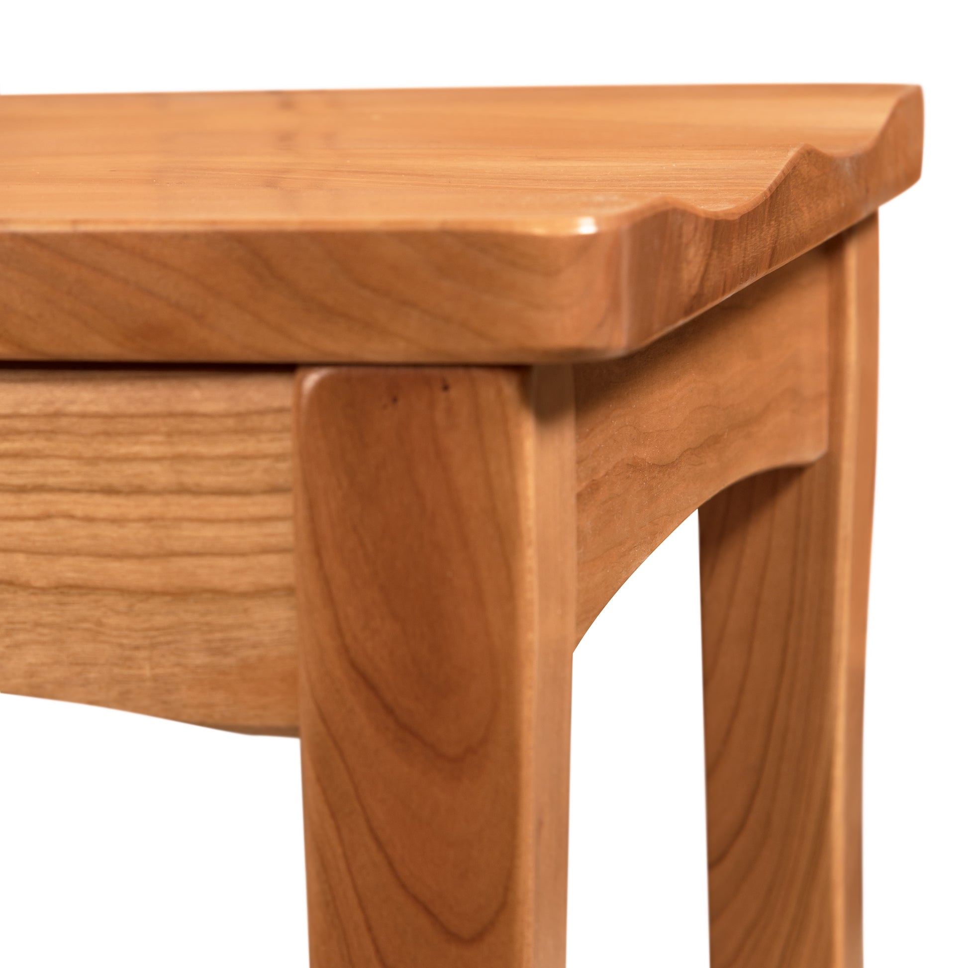 A close up image of a wooden table.