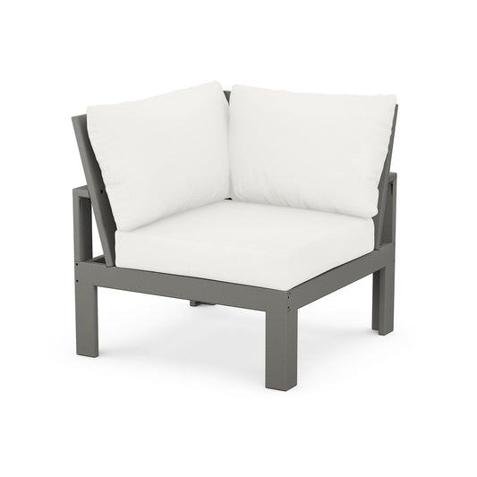 A modern, gray POLYWOOD Modular Corner Chair with thick white cushions on the seat and back, isolated on a white background.