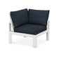 A modern white frame POLYWOOD Modular Corner Chair with deep blue cushions on a white background.