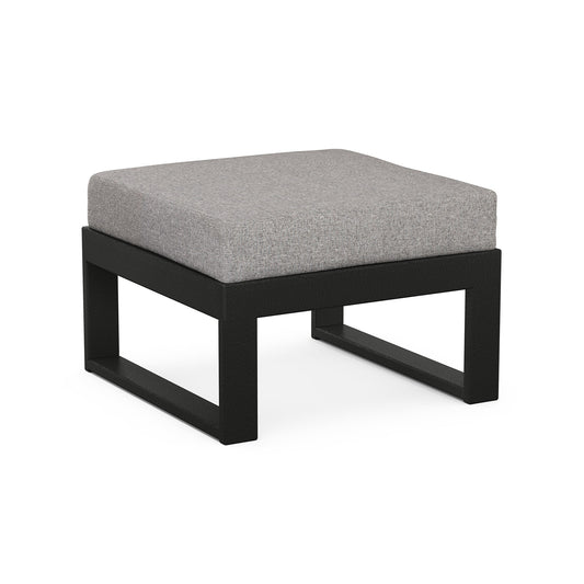A modern POLYWOOD Modular Ottoman with a black wooden frame and a light gray cushioned top, part of the EDGE Outdoor Furniture Collection, isolated on a white background.