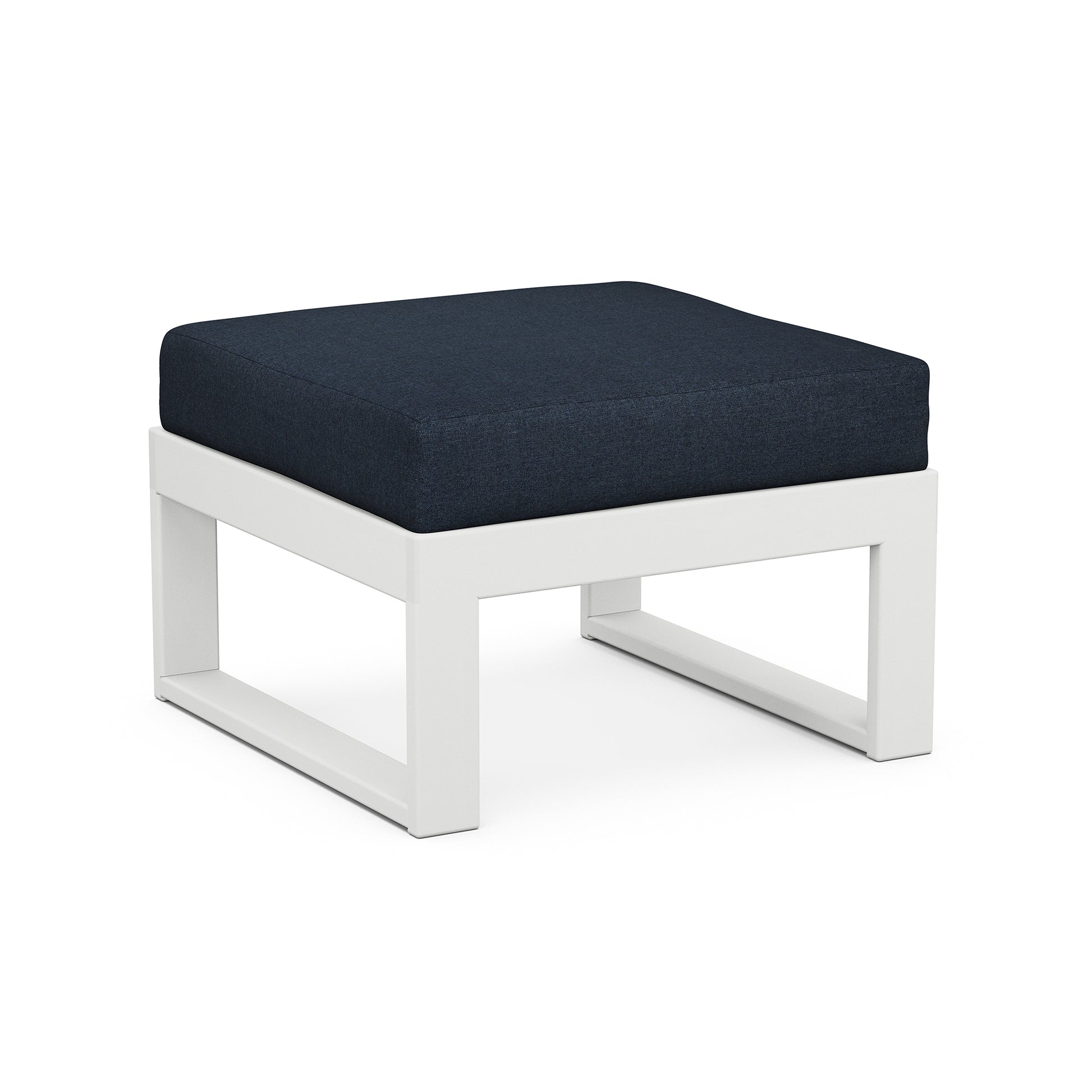 A modern POLYWOOD Modular Ottoman from the EDGE Outdoor Furniture Collection, with a dark blue cushion on a white POLYWOOD® Modular base, isolated on a white background.
