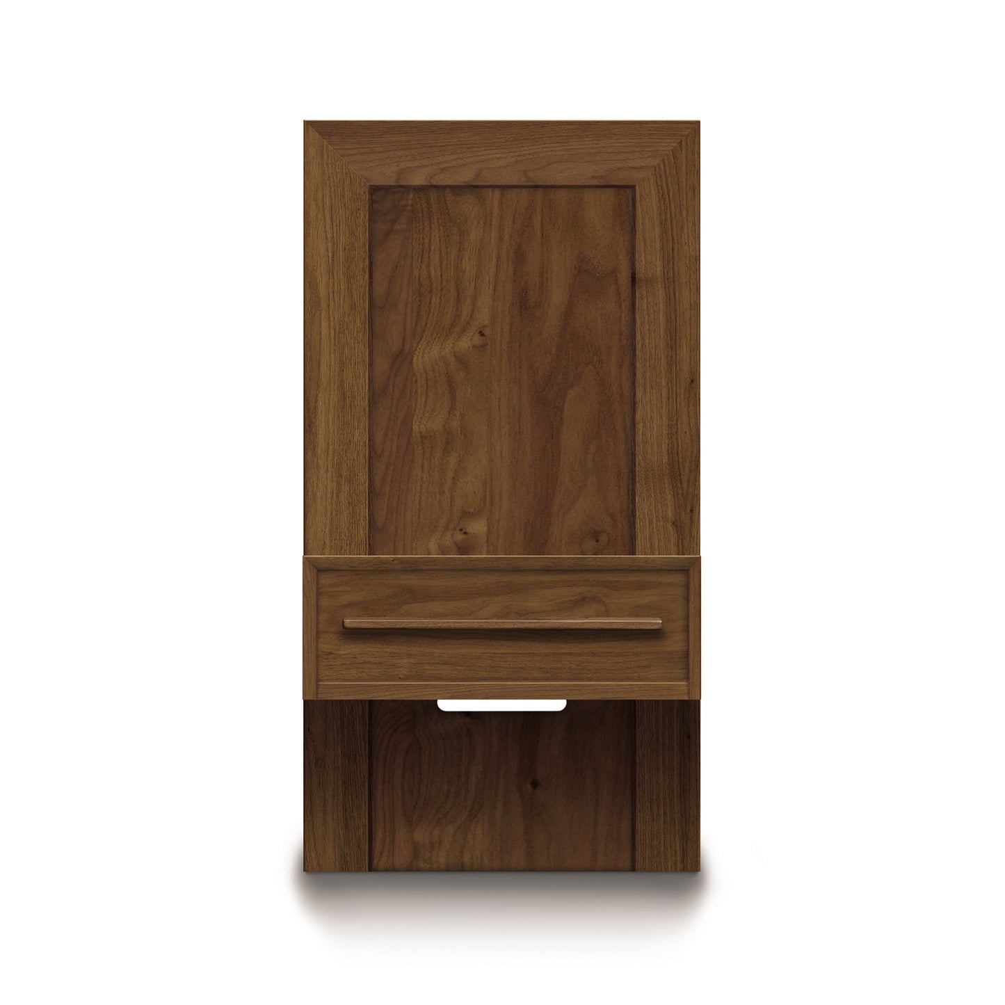 The Copeland Furniture Moduluxe Attached Nightstand with Drawer from the Storage Bed Series is a wooden, wall-mounted cabinet featuring a rectangular shape and a single drawer. Crafted from solid wood furniture, it boasts a smooth and polished finish with visible wood grain patterns. The drawer features a small cutout handle against a plain white background.