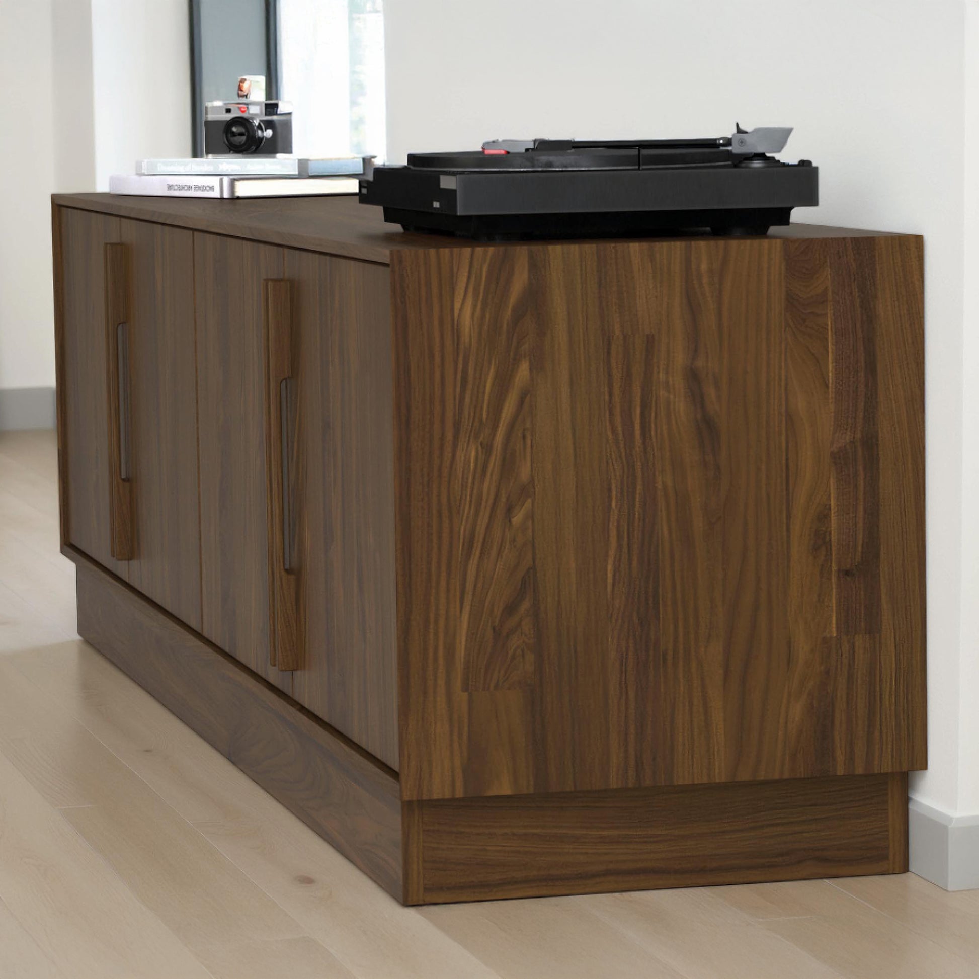 Copeland Furniture Moduluxe Media Console showcasing American craftsmanship, designed to support audio equipment like a record player.