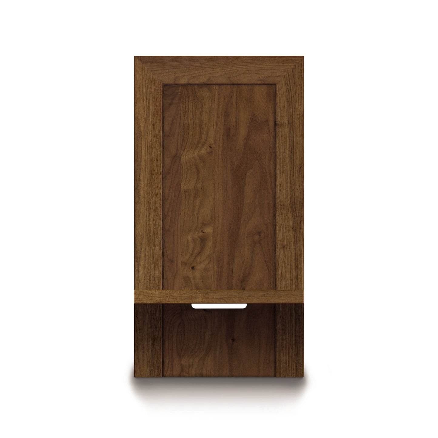 A single, closed wooden cabinet door with a metal handle from the Copeland Furniture Moduluxe Attached Nightstand with Shelf - 35" Series, isolated on a white background.