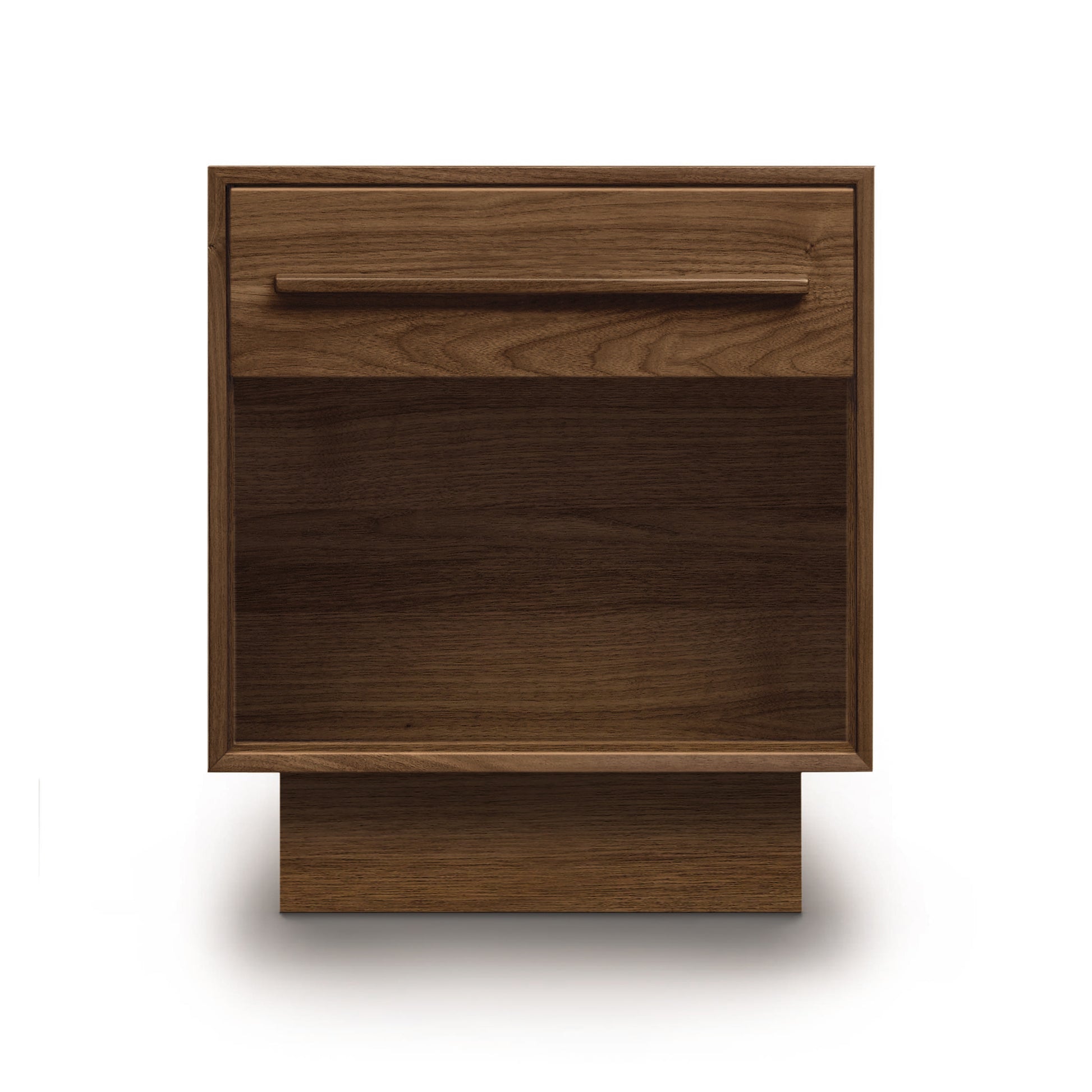 A Copeland Furniture Moduluxe 1-Drawer Enclosed Shelf Nightstand, made of wood, featuring a single drawer on top.