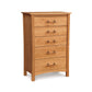 A cherry wood Copeland Furniture Monterey 5-Drawer Chest tallboy dresser with metal handles on a white background.