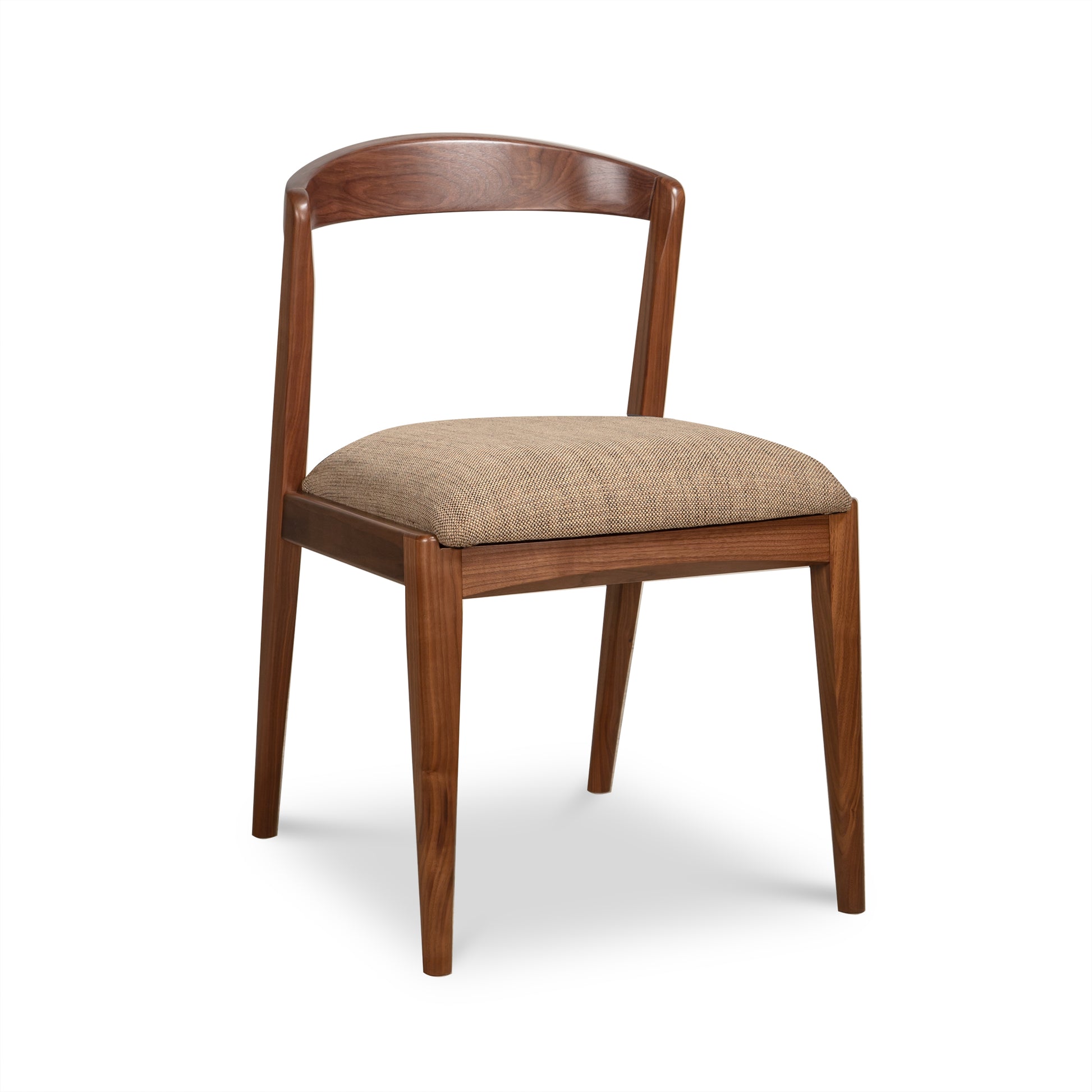 Montgomery Chair by Vermont Woods Studios featuring a natural cherry wood frame, curved backrest, and light brown upholstered seat.