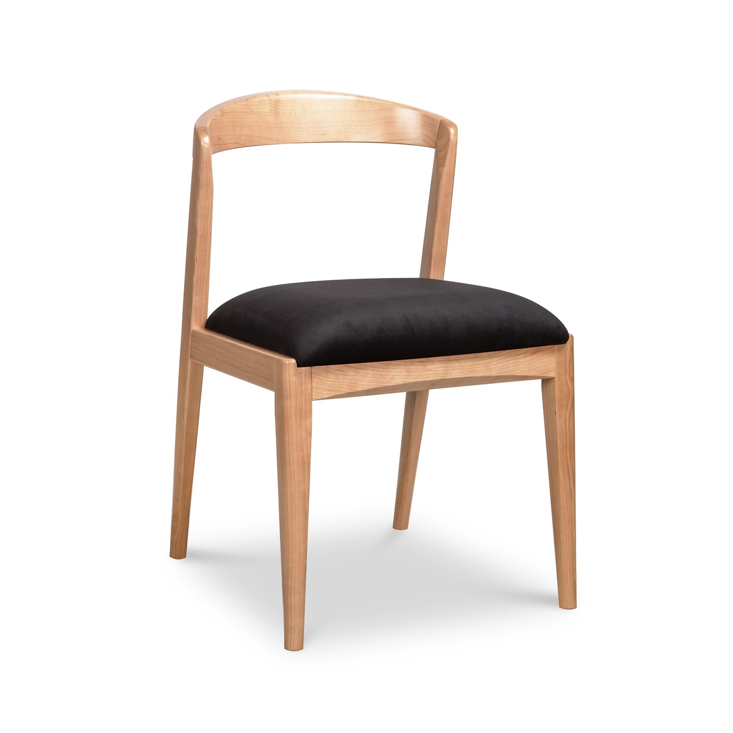 Montgomery Chair by Vermont Woods Studios featuring a natural cherry wood frame and black upholstered seat. Expertly crafted American made furniture.