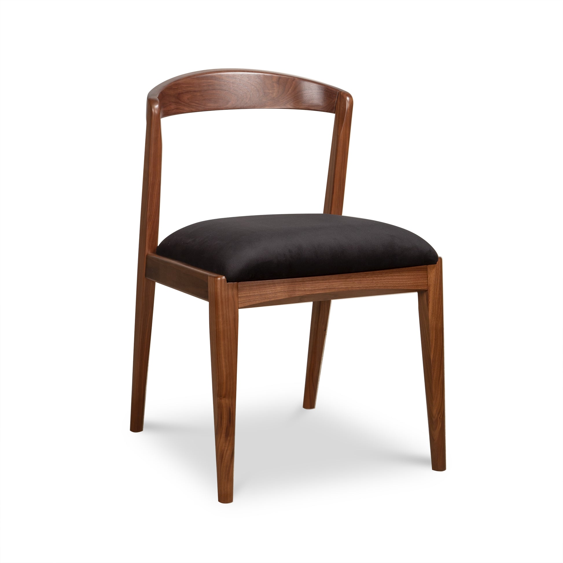 Montgomery Chair by Vermont Woods Studios featuring a natural cherry frame, curved backrest, and black upholstered seat. American made quality furniture.