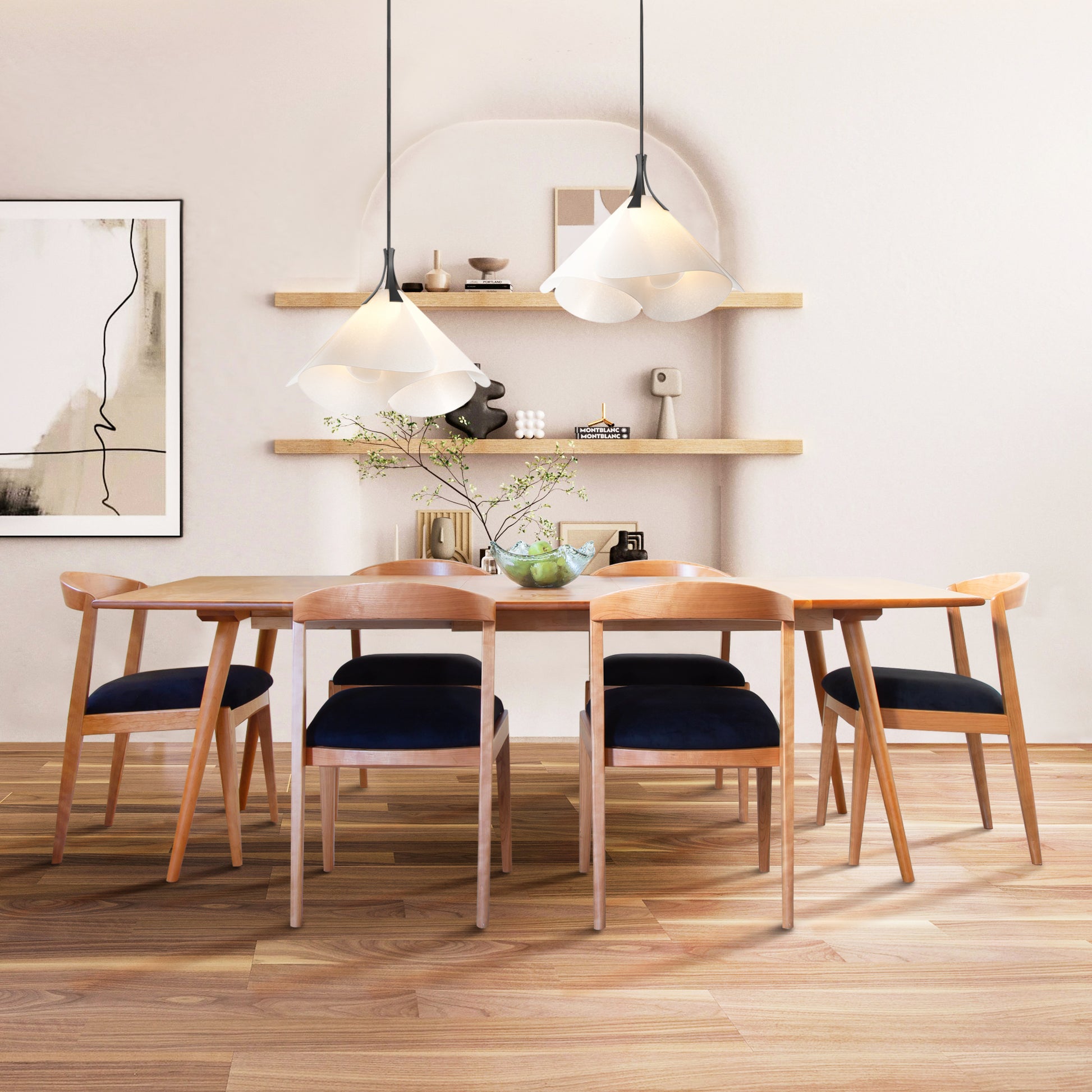 Six Vermont Woods Studios Montgomery Chairs in natural cherry surround a matching wood dining table, showcasing handcrafted American furniture.