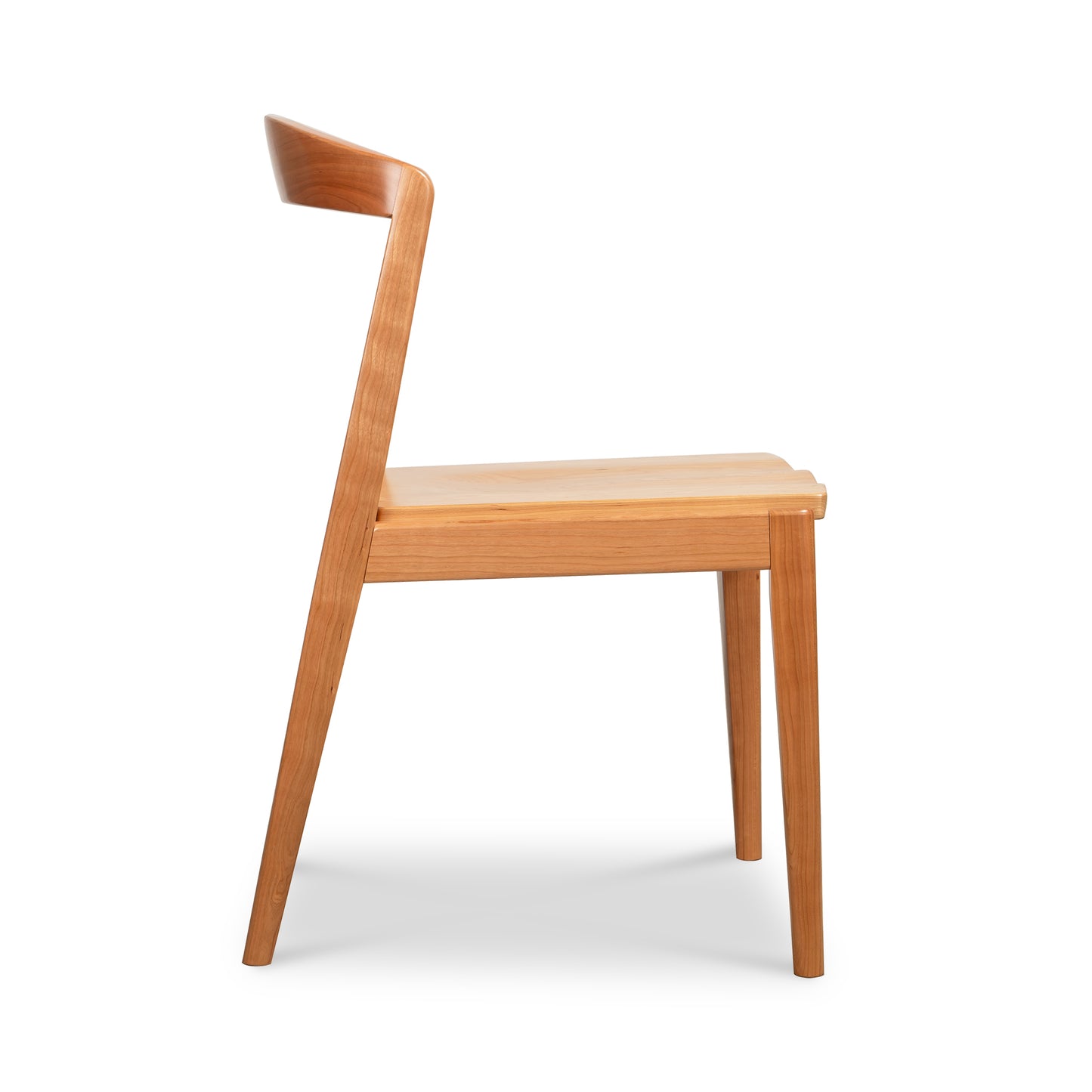 Montgomery Chair by Vermont Woods Studios featuring a wood seat, curved backrest, and straight legs, expertly crafted in America.